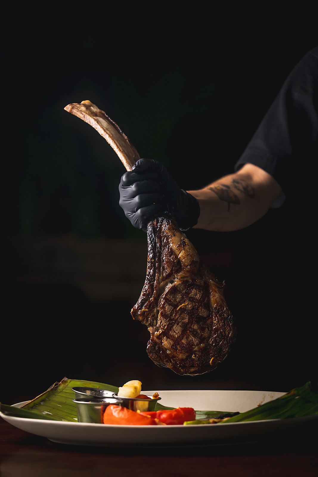 Black Angus steak with grilled vegetables and sides